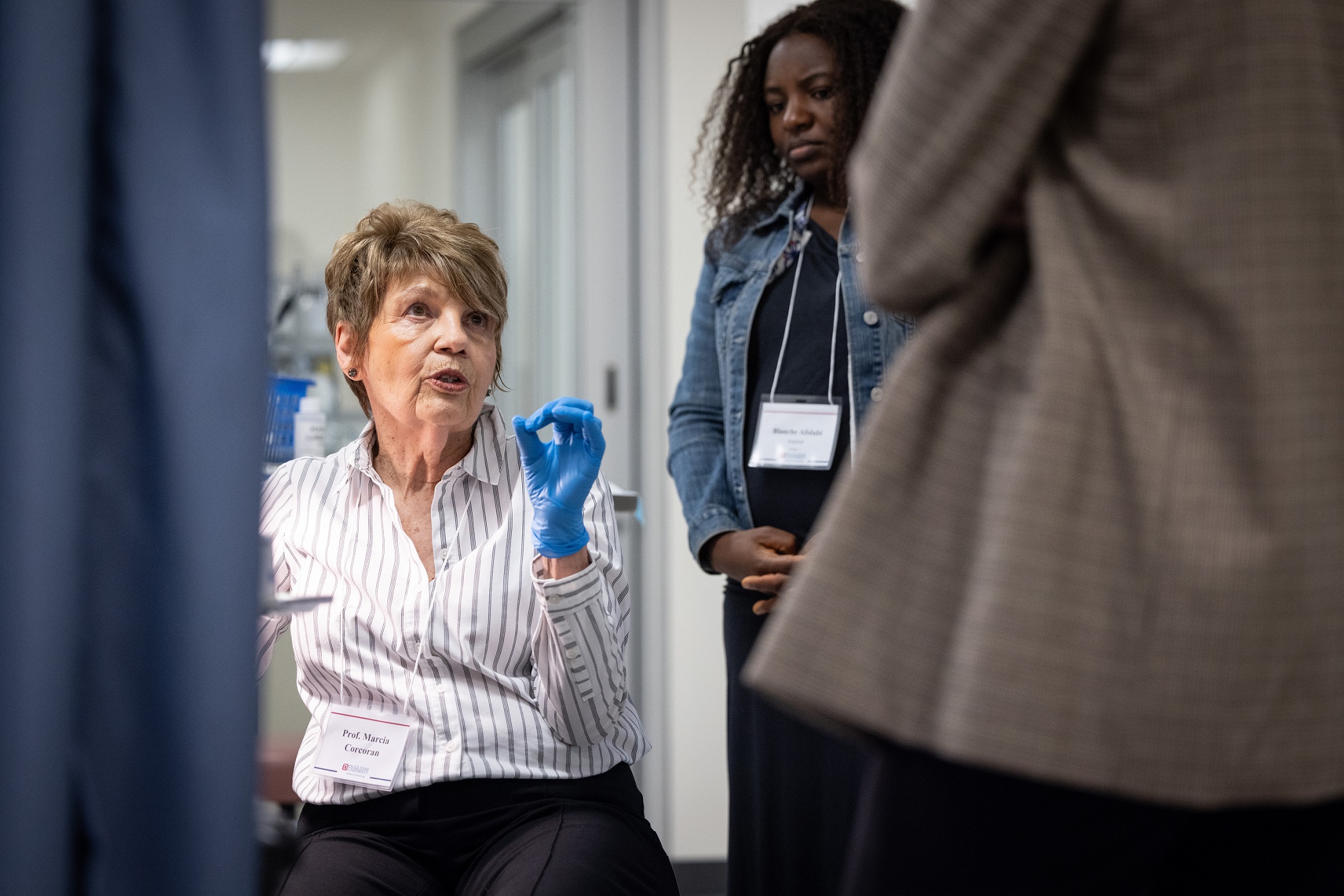 A health care educator gives a demonstration.
